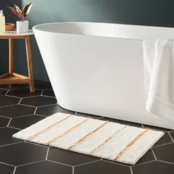 20"x30" Modern Tufted Stripe Bath Rug Yellow/Cream - Threshold™